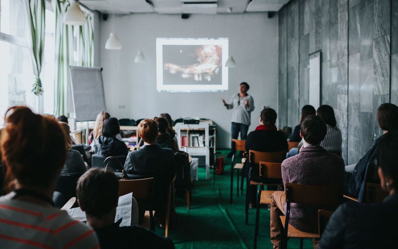 Participants attending a live training presentation